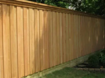 board-on-board fence with double trim and top-cap