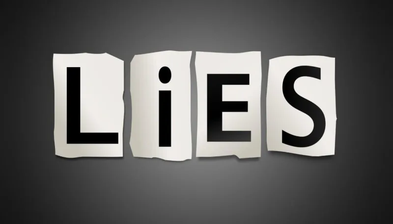 cut out letters spelling lies