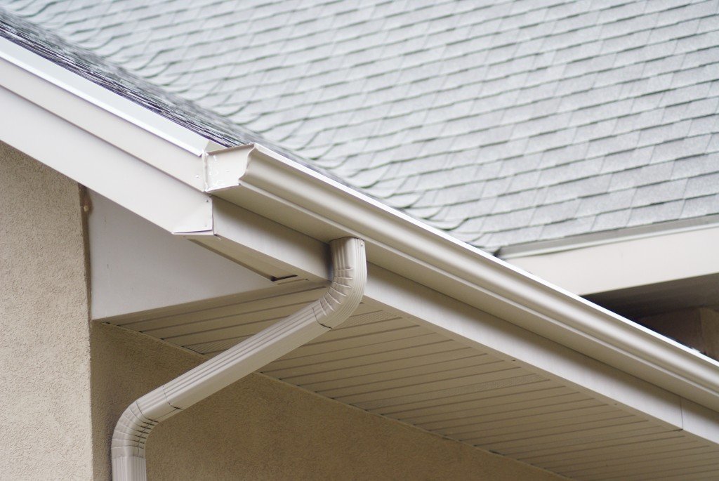 white aluminum k-style gutters with downspout