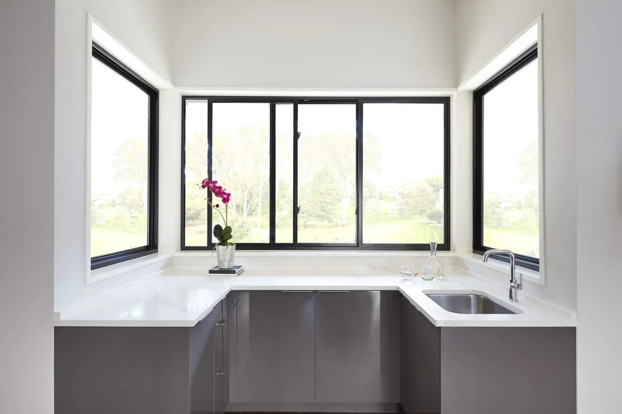 Pella Impervia fiberglass picture and sliding windows